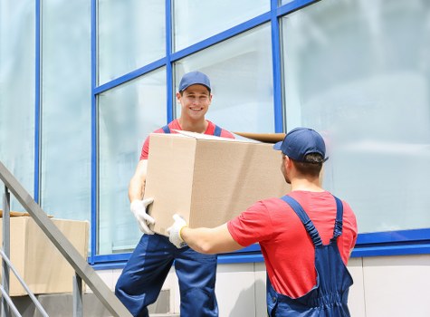Loading furniture into a removal truck for a Chelsea home move