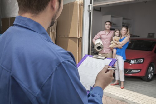 Chelsea removals team managing a residential move on a local street