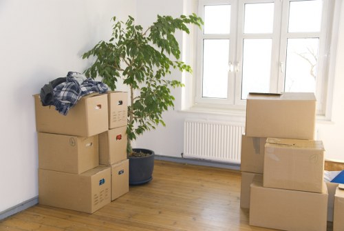 Boxes and furniture being prepared for a home move in Chelsea