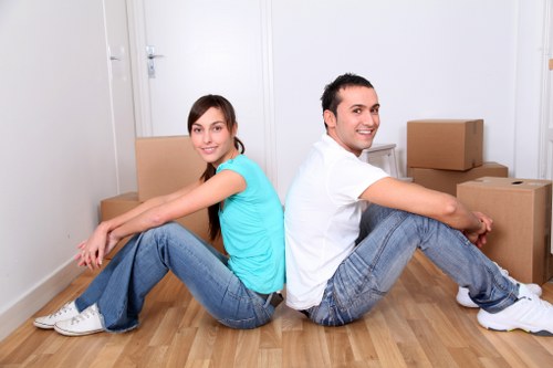 Local Chelsea van and man team managing a small relocation