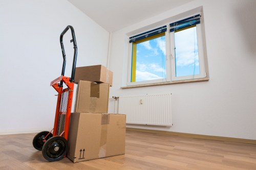 Chelsea flat moving service with boxes and furniture